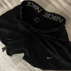 straight black nike shorts